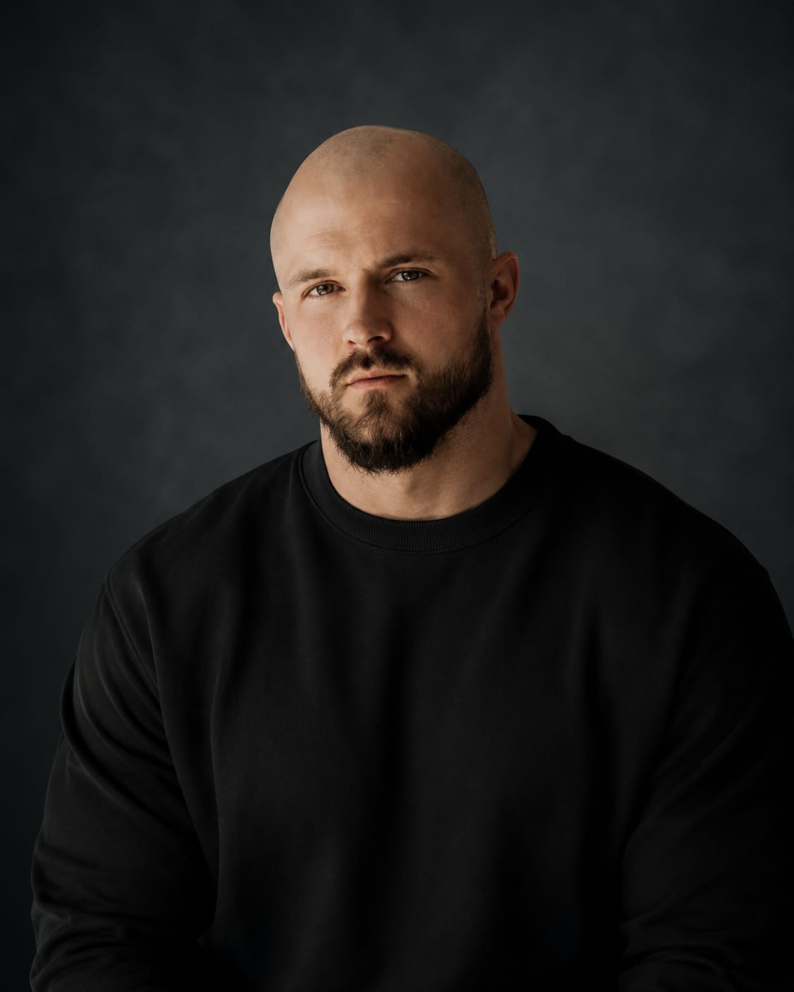 Chancellor Aven in a black crewneck